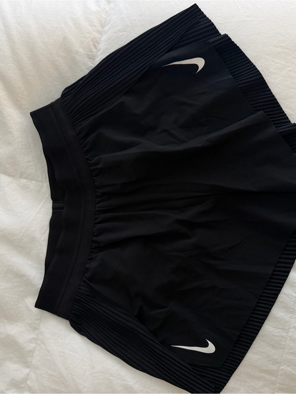 Nike Women's Black Athletic Shorts with White Swoosh Accents